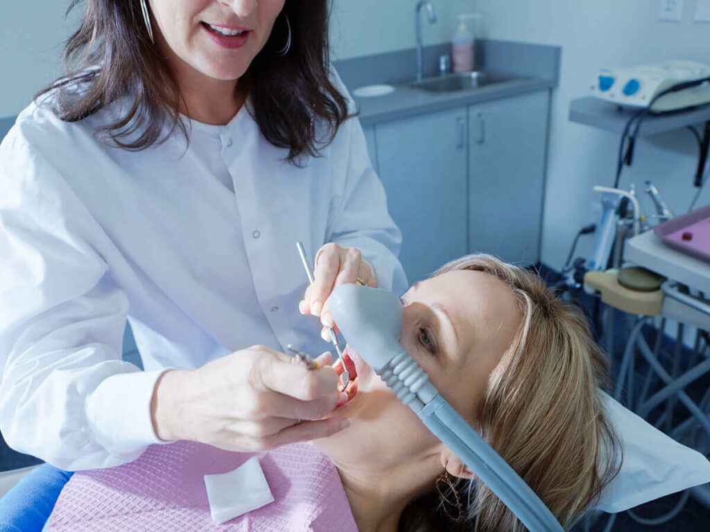 dentist working on female patient