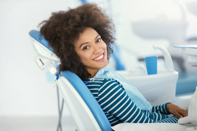 girl patient smiling in chair