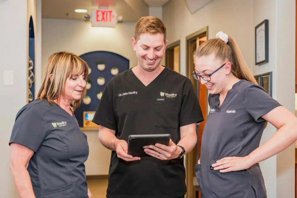 sladky showing workers ipad